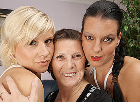 Three naughty old and young lesbians do it above the couch